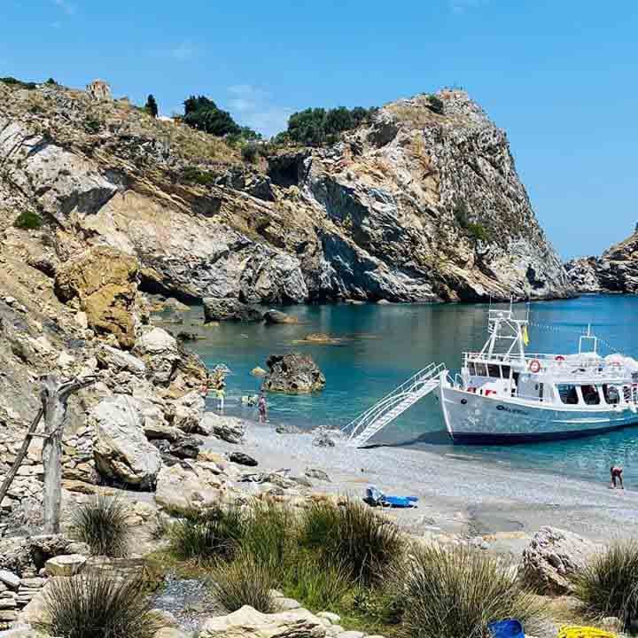 Kalypso boat sailing near Lalaria Beach during our Around the Island Skiathos Cruise