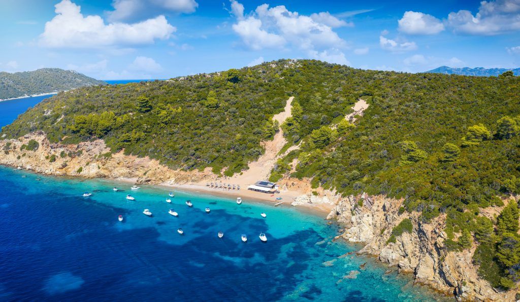 Arkos Beach Skiathos 2026 – peaceful cove with crystal waters and beach tavern
