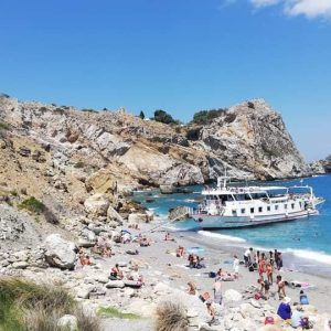 Daily boat trip around Skiathos with stops at Lalaria, Kastro, and hidden beaches