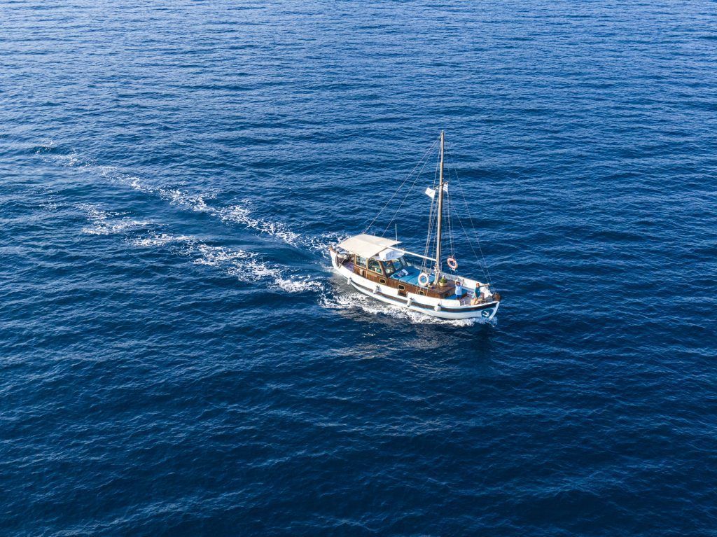 Traditional wooden private boat in Skiathos, ideal for relaxed family charters, slow cruising and photo-perfect days at sea.