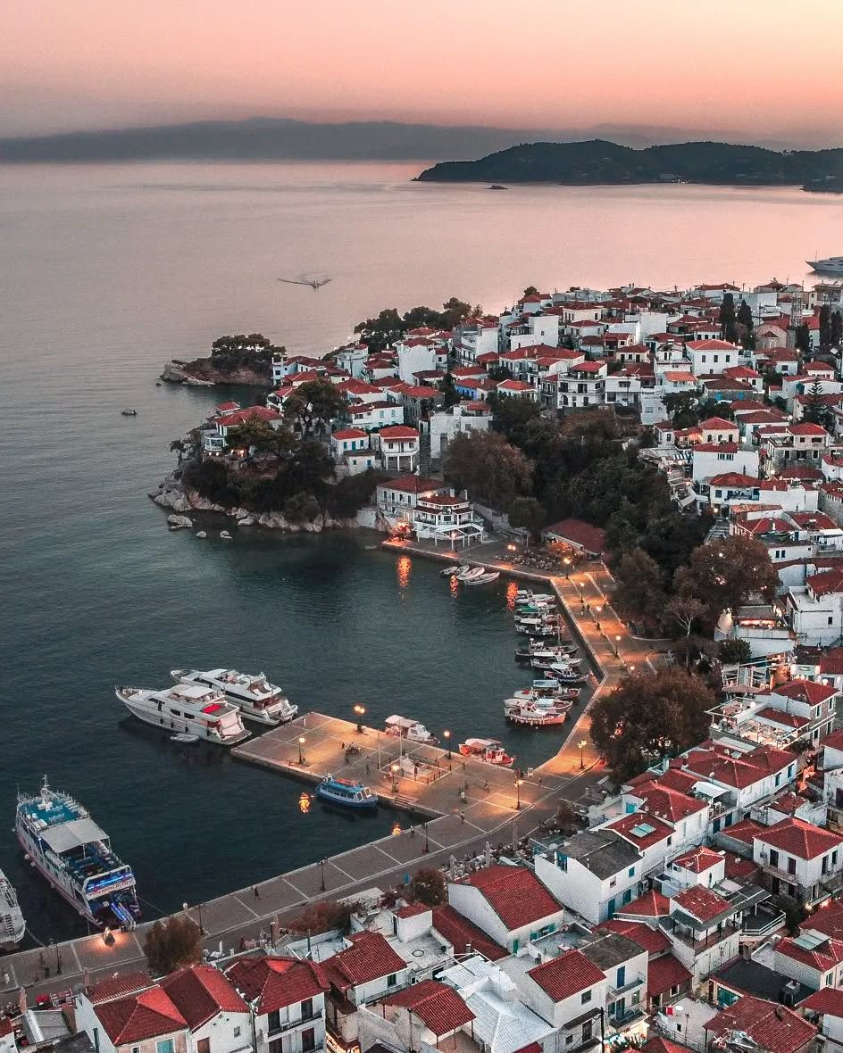 Skiathos nightlife 2025 aerial photo of the town glowing at night