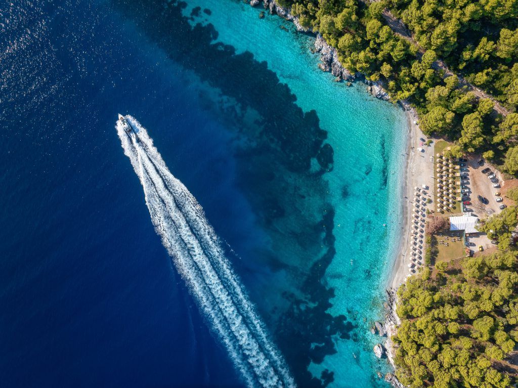 Skiathos boat charter 2026, aerial approach to Skopelos