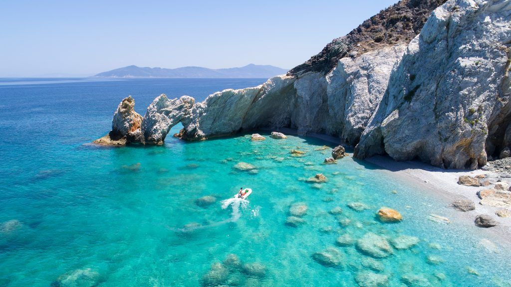 Lalaria Beach Skiathos Greece with turquoise waters and natural rock arch